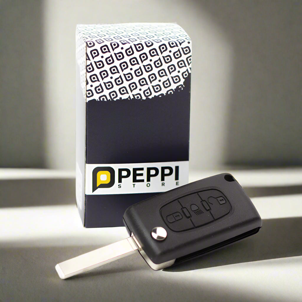 Fekete színű, 3 gombos Citroen kulcs, bicskakulcs mintás díszdobozzal.