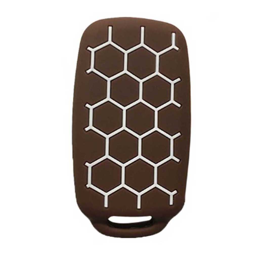 Barna színű, 3 gombos VW kulcs szilikon tok fehér mintával.