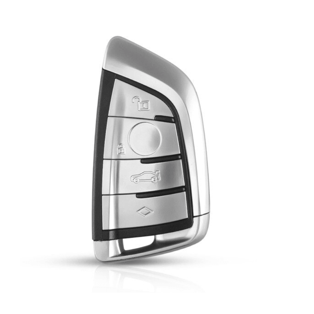 Ezüst és fekete színű, 4 gombos BMW kulcs, kulcsház.