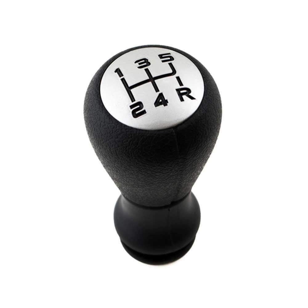 Fekete színű, 5 sebességes Peugeot váltógomb. Ezüst színű, 5 fokozatos számlappal.