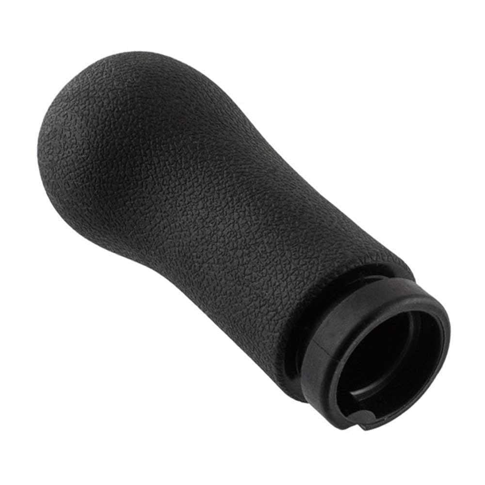 Fekete színű, 5 sebességes Ford váltógomb.