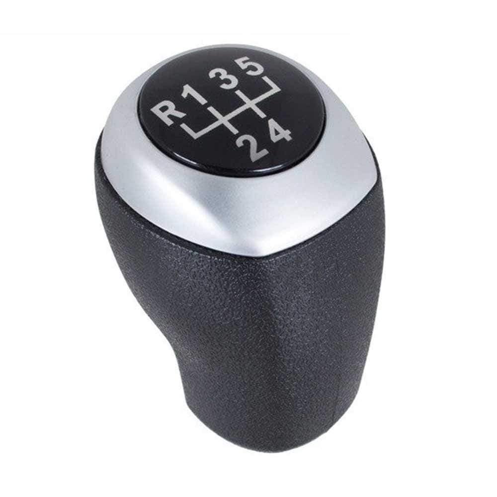 Fekete színű, 5 sebességes Hyundai váltógomb. Fekete színű számlappal, ezüst számlapkerettel.