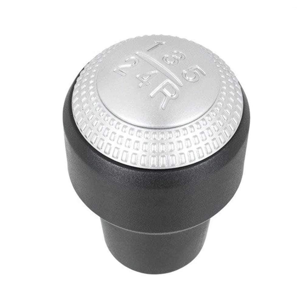 Fekete színű, 5 sebességes Hyundai váltógomb. Ezüst színű számlappal.