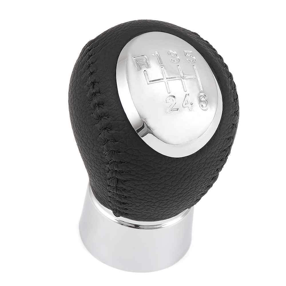 Fekete bőr Mazda váltógomb. 6 sebességes, ezüst, krómozott számlappal.