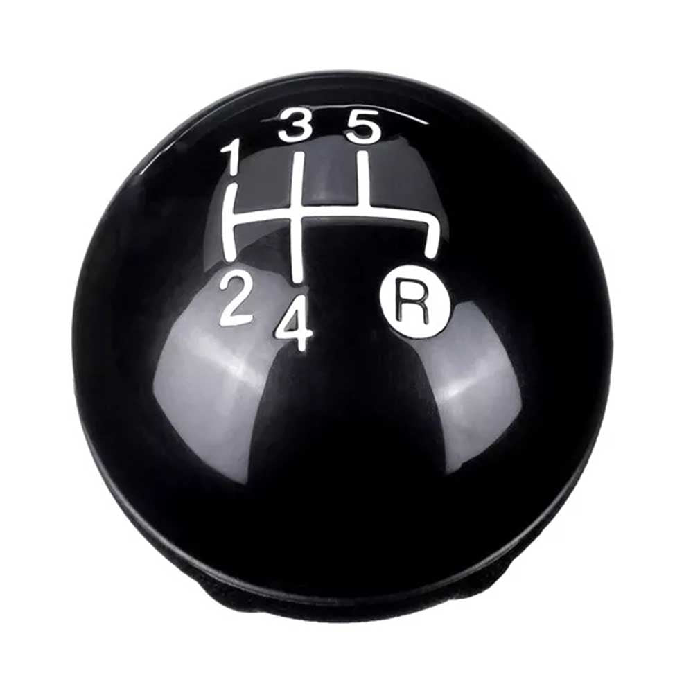 Fekete színű, 5 sebességes Fiat váltógomb. Fényes fekete számlappal, ezüst fokozatokkal.