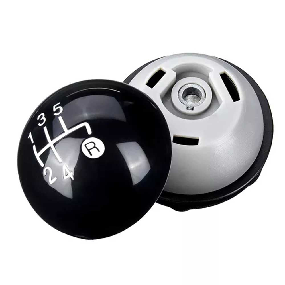 Fekete színű, 5 sebességes Fiat váltógomb. Fényes fekete számlappal, ezüst fokozatokkal.