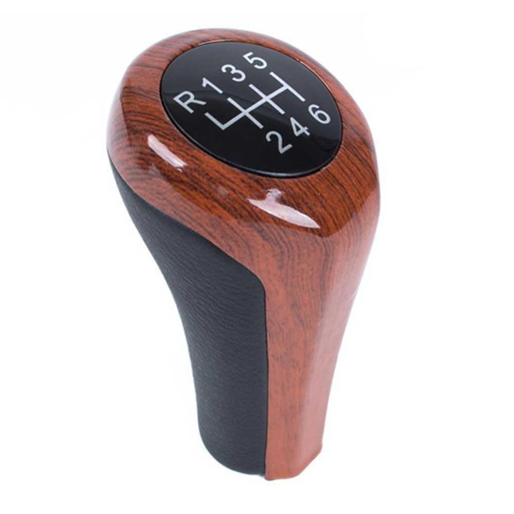 Fa mintás, 6 sebességes BMW váltógomb. Fekete színű számlappal.