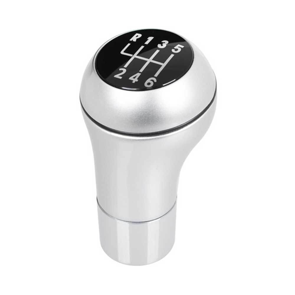 Ezüst-króm színű, 6 sebességes BMW váltógomb. 6 fokozatos, fekete színű üveg számlappal.