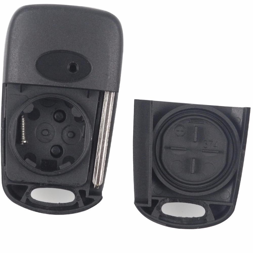 Fekete színű, 3 gombos Kia kulcs, bicskakulcs belseje.