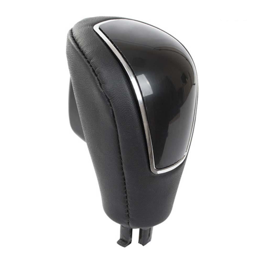 Fekete színű, bőrözött automata Ford váltógomb. Fekete színű üveg számlappal, króm számlapkerettel.