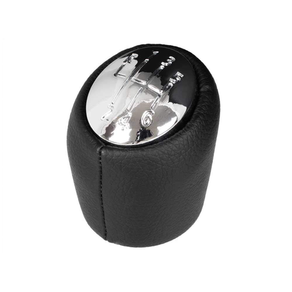 Fekete, bőrözött 6 sebességes Renault váltógomb. Krómozott számlappal.