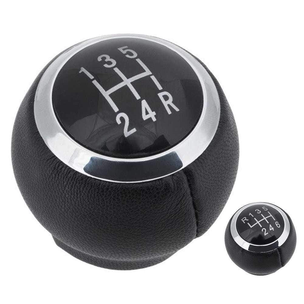 Fekete színű, bőrözött 5 és 6 sebességes Toyota váltógomb. Fekete színű számlappal, króm számlapkerettel.