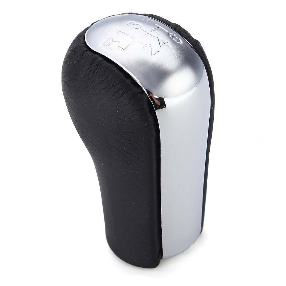 Fekete, krómozott 6 sebességes Toyota váltógomb.