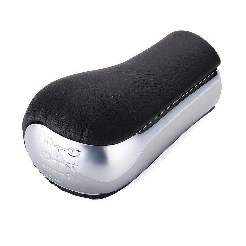 Fekete, krómozott 6 sebességes Toyota váltógomb.