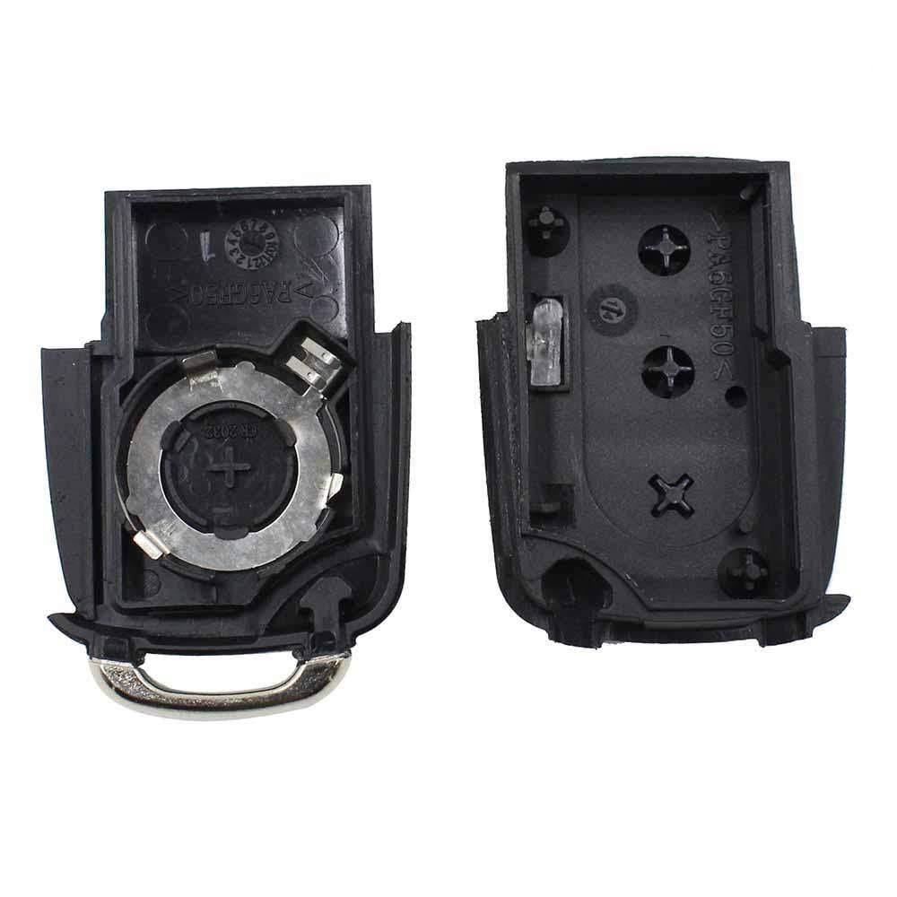 Fekete színű, 3 gombos VW bicskakulcs, kulcsház szétszedve.